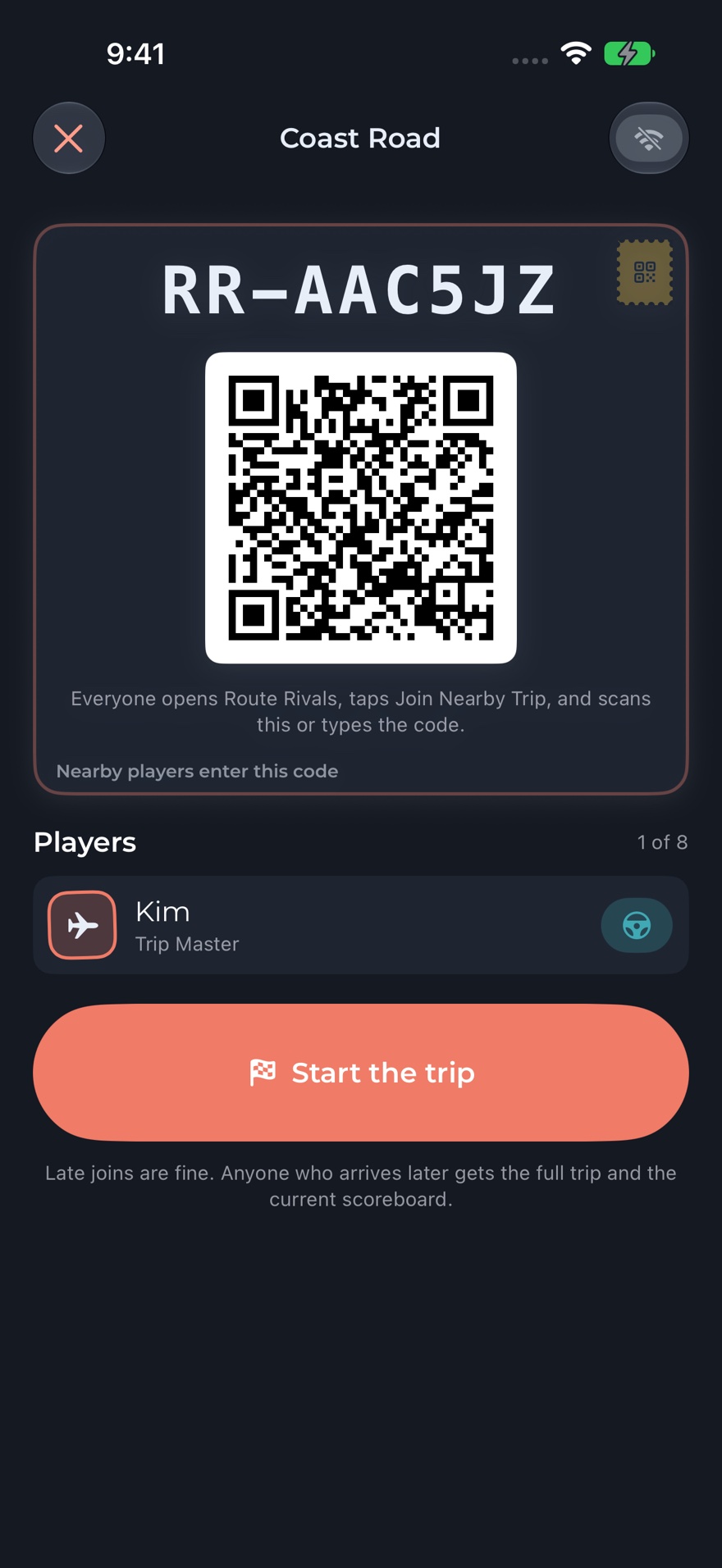 The host's lobby showing a six-character join code above a QR code for the other phones to scan
